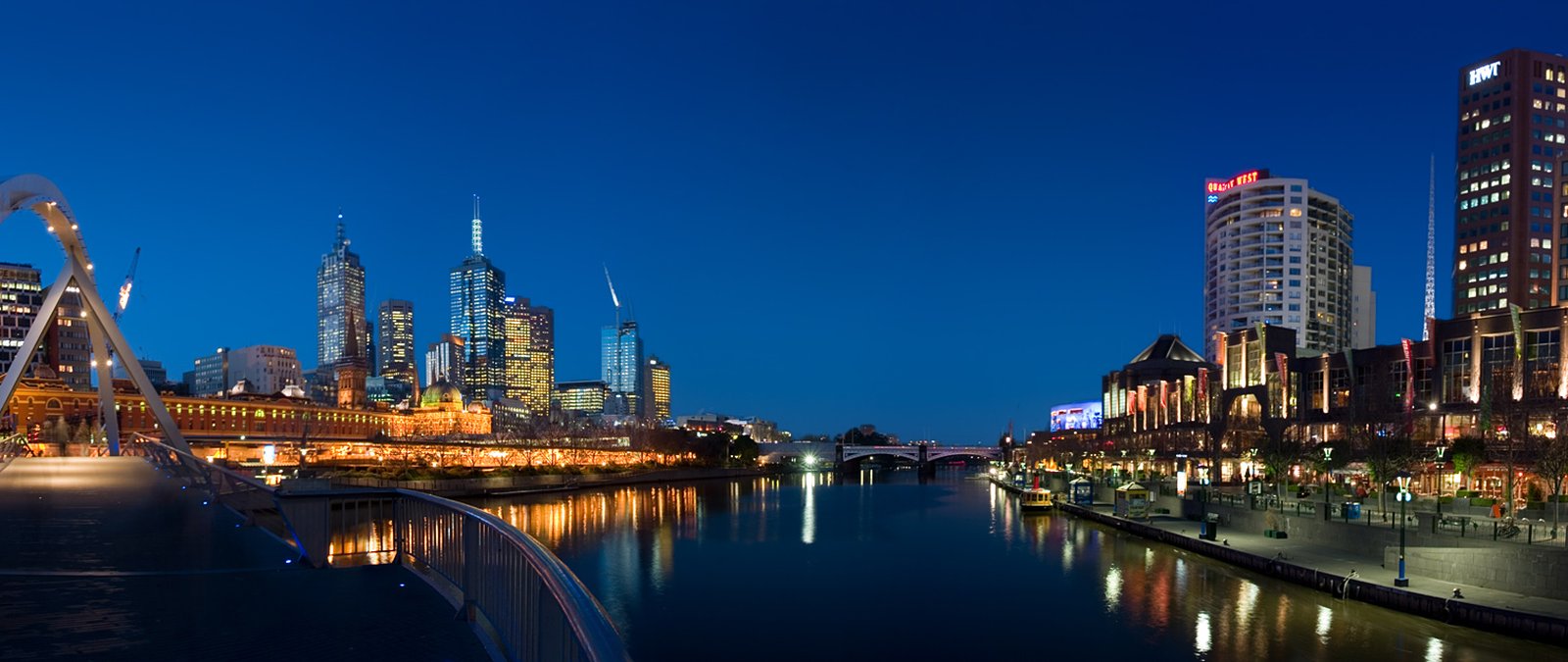 The Yarra River at twilight with the Melbourne skyline and Southbank lit on either side