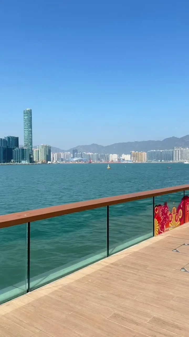 Wooden boardwalk extending toward Victoria Harbour