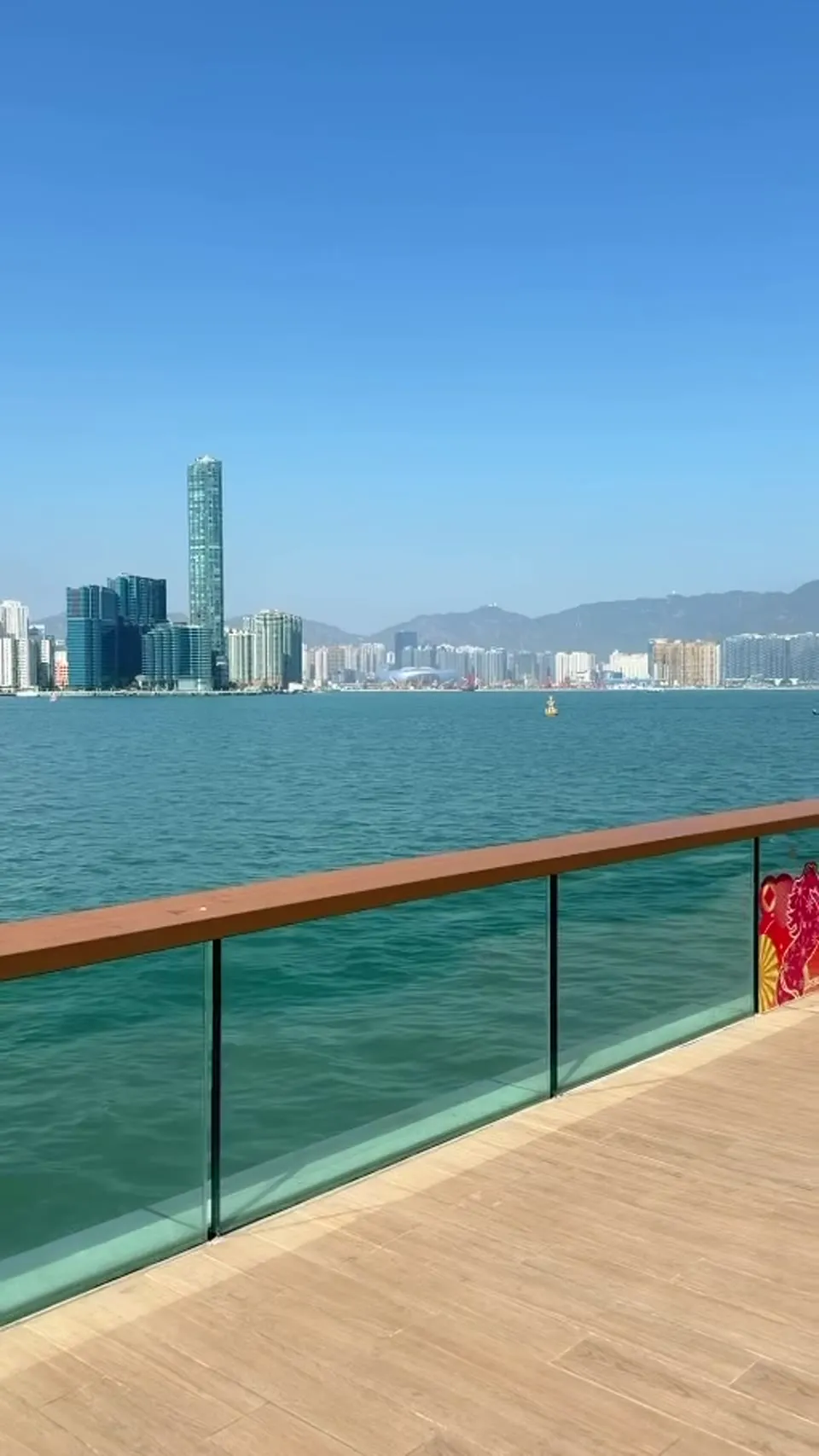 Hong Kong's waterfront promenade on a clear day