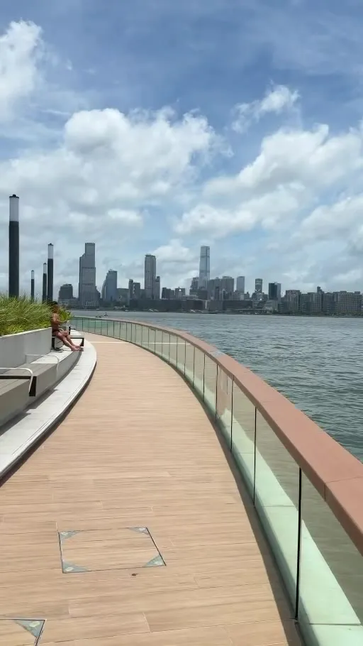 Victoria Harbour waterfront promenade and the skyline across the water