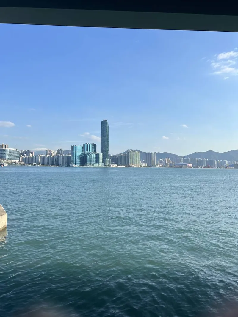 Victoria Harbour by day with sea meeting sky