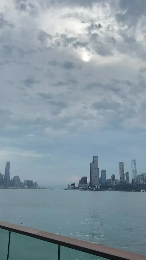Victoria Harbour and the skyline under low cloud