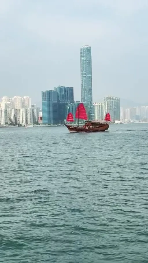 A red-sail junk on Victoria Harbour