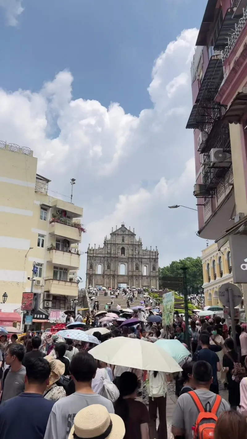 The Ruins of St. Paul’s facade with people in the square below